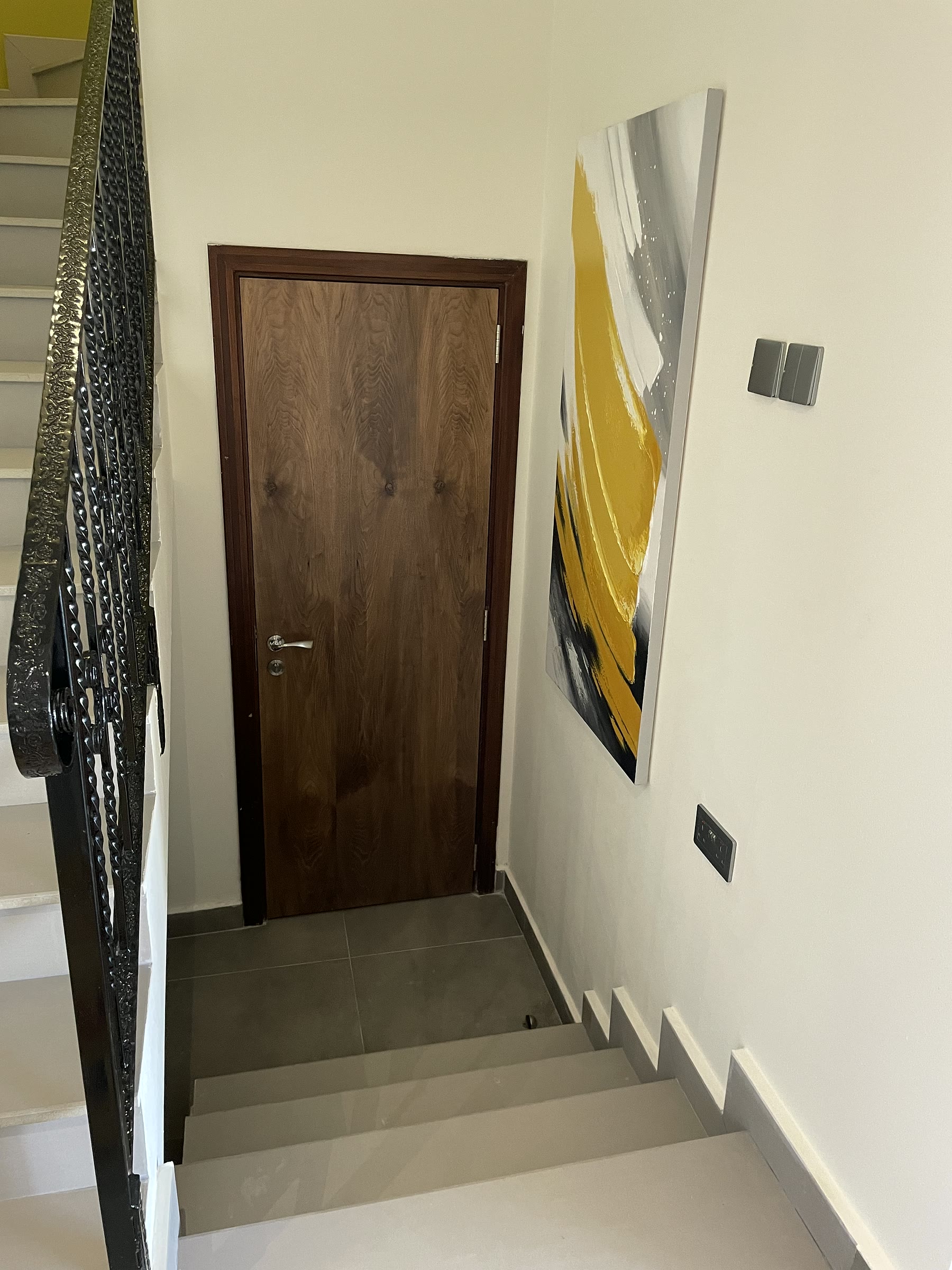 Staircase & Entrance after the Al Hamra Village townhouse renovation and landscaping