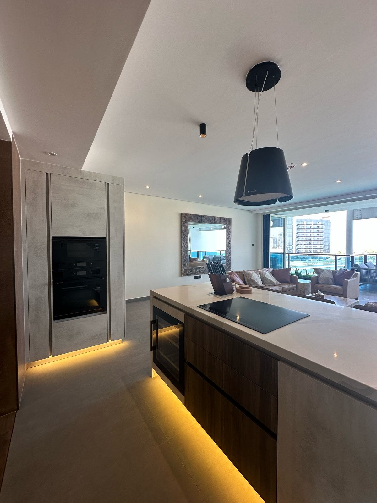 Completed kitchen island and pendant lighting