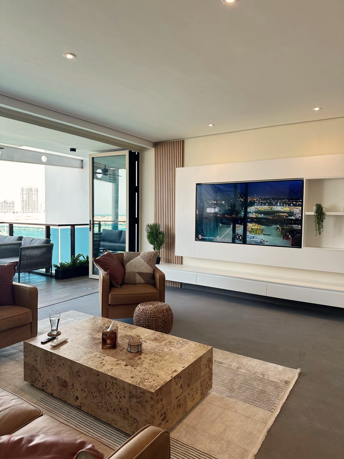 Completed furnished living room with lagoon views