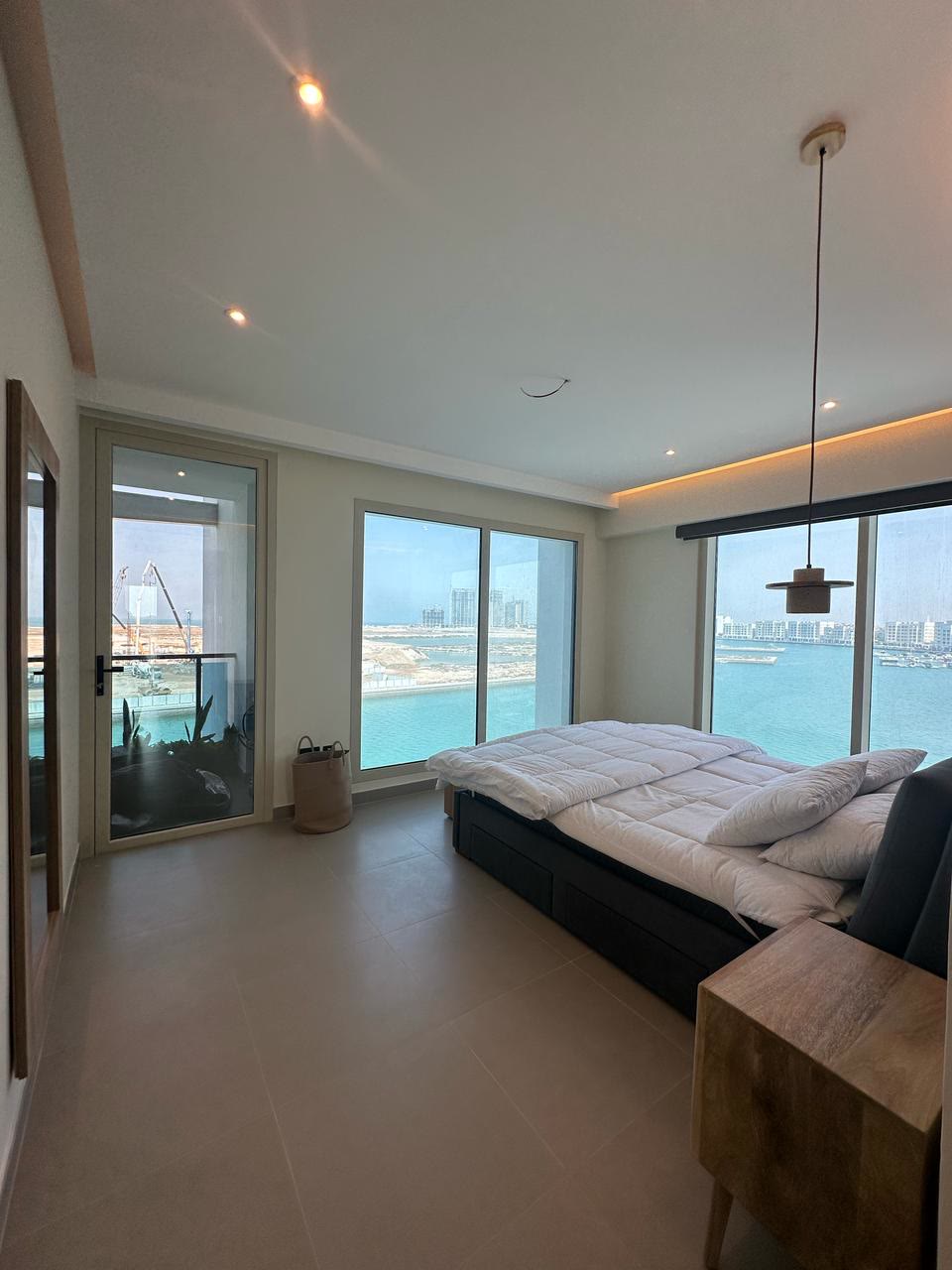 Completed furnished master bedroom with lagoon views