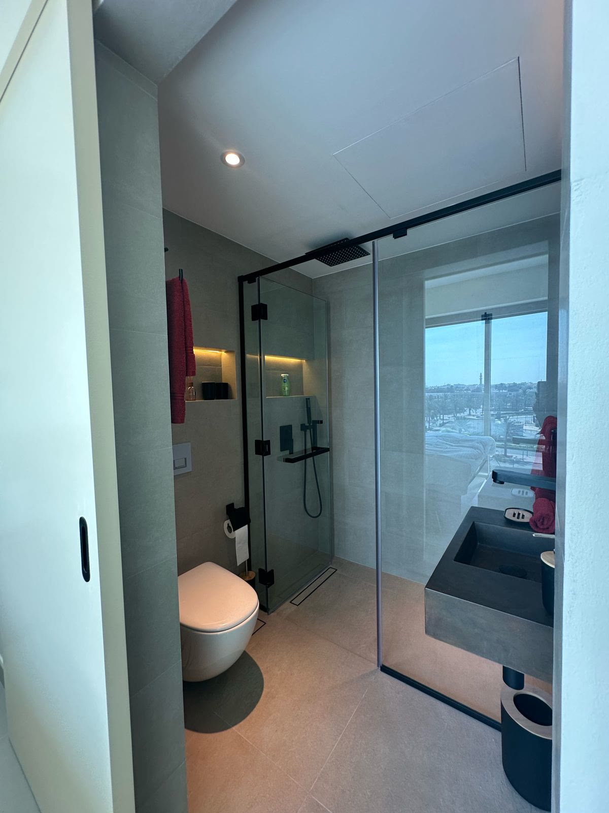 Completed glass shower room with integrated lighting