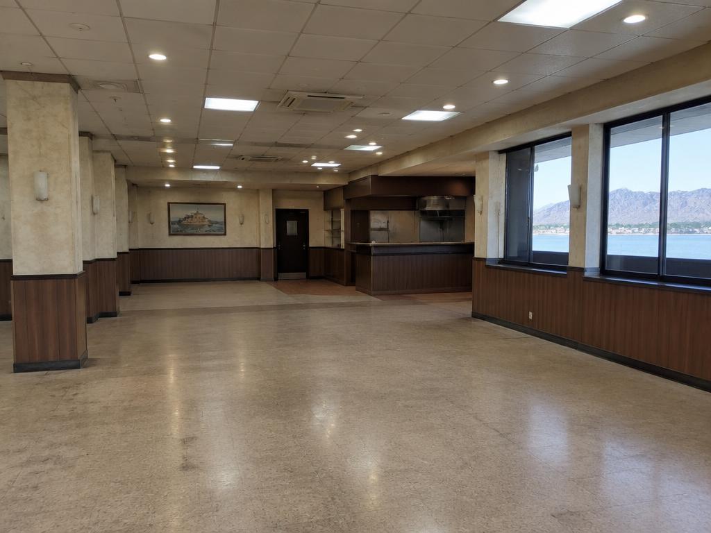 Dated restaurant dining room before refurbishment in Ras Al Khaimah